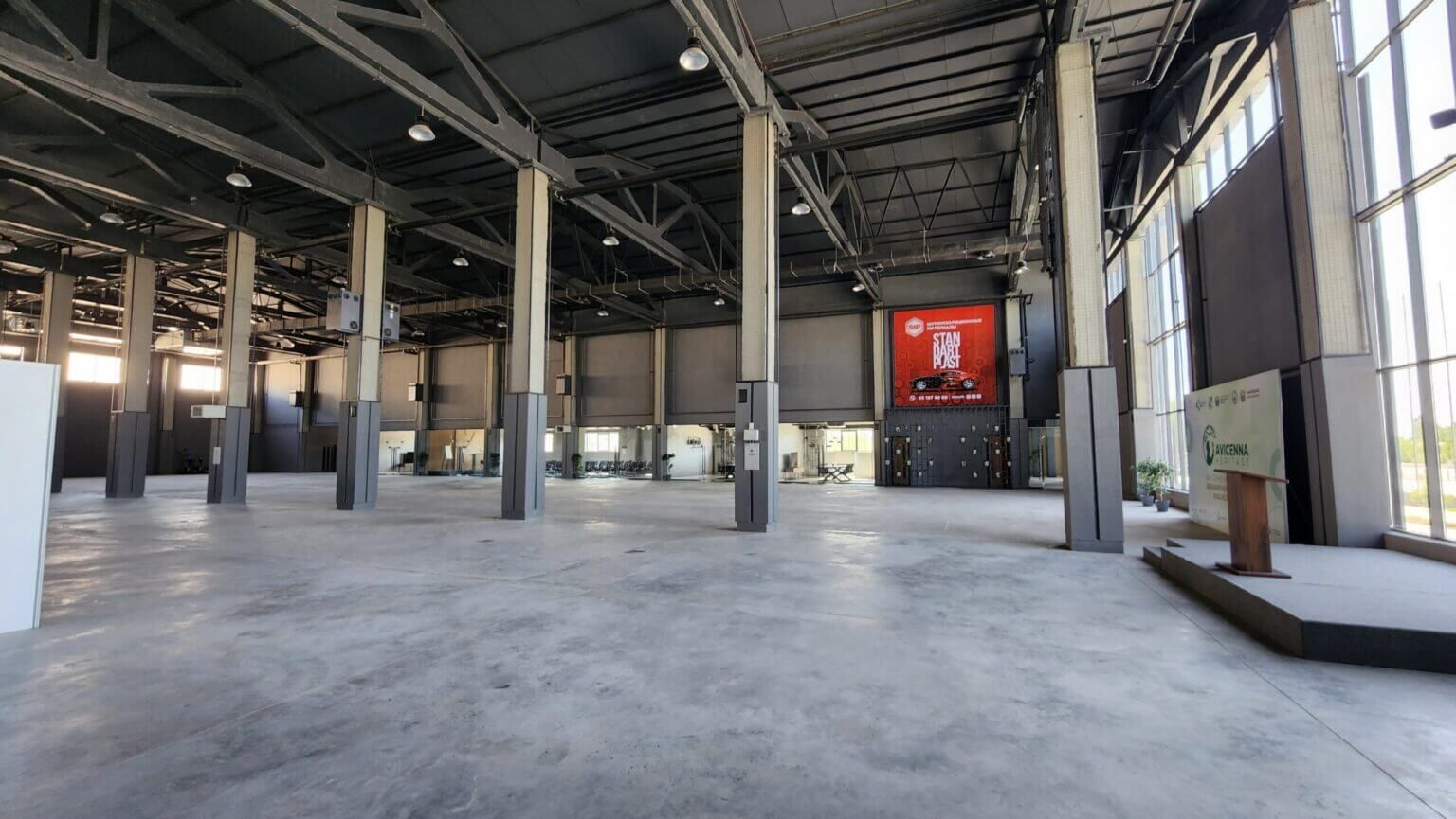 Inside the SOF Expo indoor pavilion: a spacious columned hall