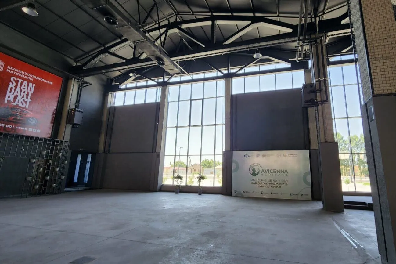A large advertising banner on the wall of the SOF Expo indoor pavilion